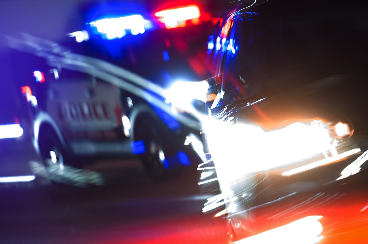 A police car chasing another vehicle